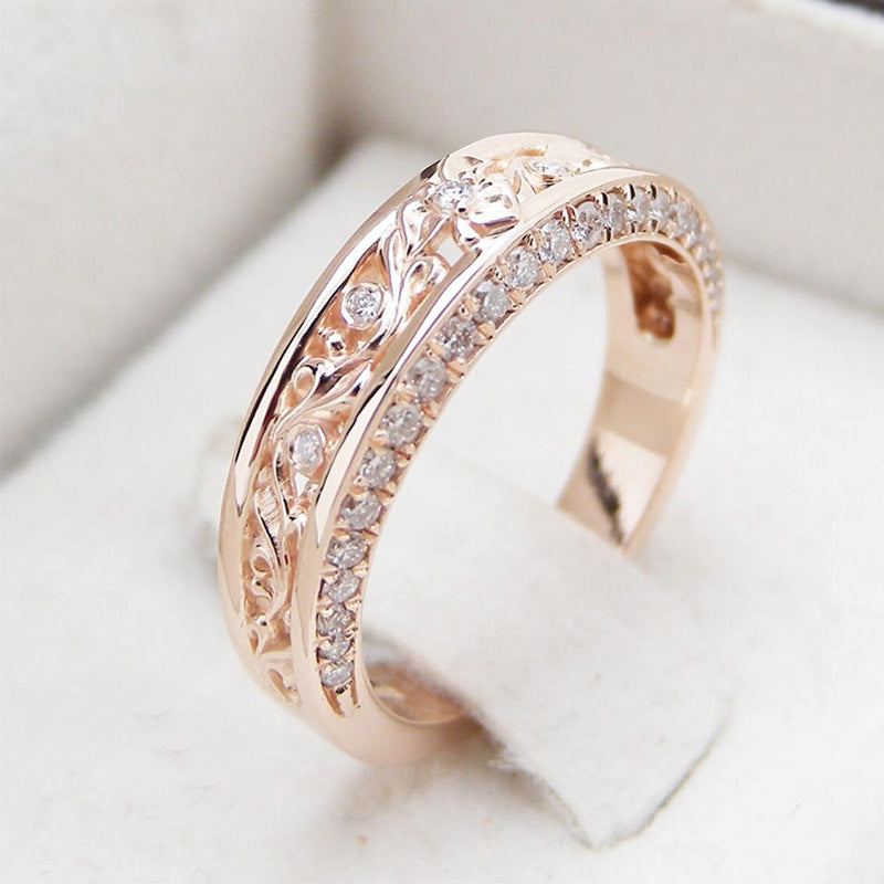 Hollow ring with diamonds in antique gold and silver